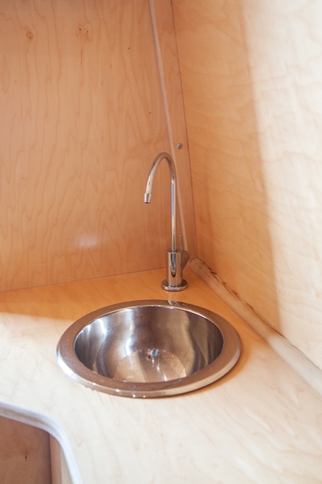 A close-up of the sink inside the Wheely Clean mobile clinic