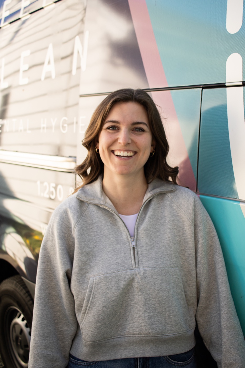 Zoe, licensed dental hygienist at Wheely Clean