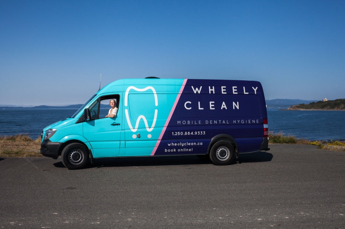 A Wheely Clean van parked at a Victoria waterfront lookout